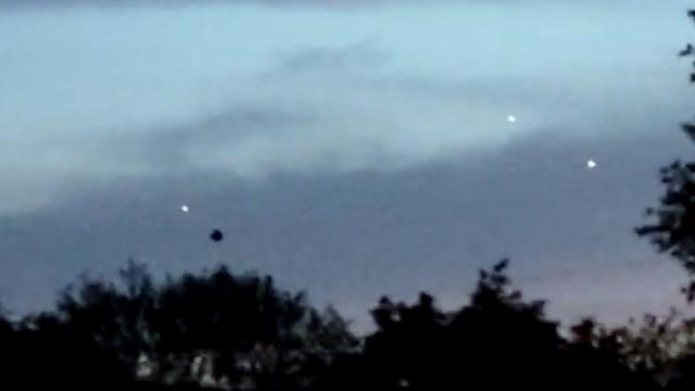 Multiple Glowing UFO Orbs Sighted Flying and Disappearing in Clouds over Colbert County in Alabama