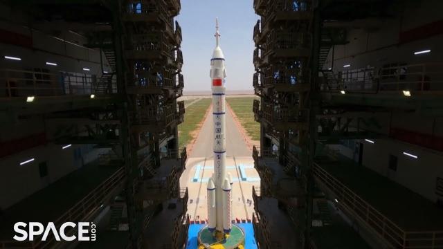 China rolls out Shenzhou 16 crew's rocket in awesome views from launch site