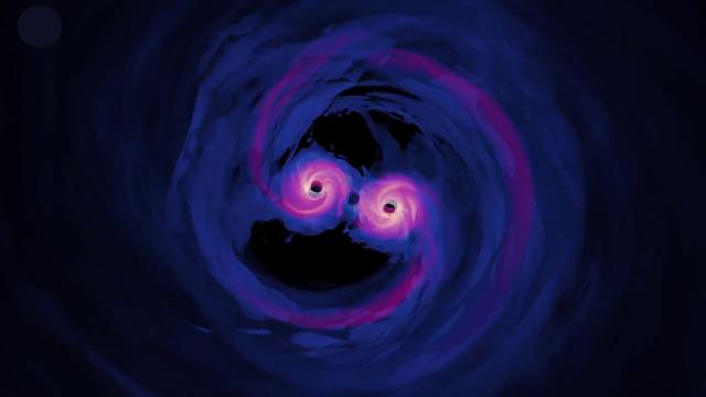 Watch Supermassive Black Holes Spiral Towards Each Other in New Simulation
