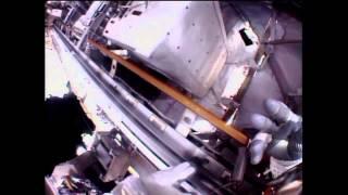 Spacewalkers Remove Refrigerator-Sized Pump From Station | Video
