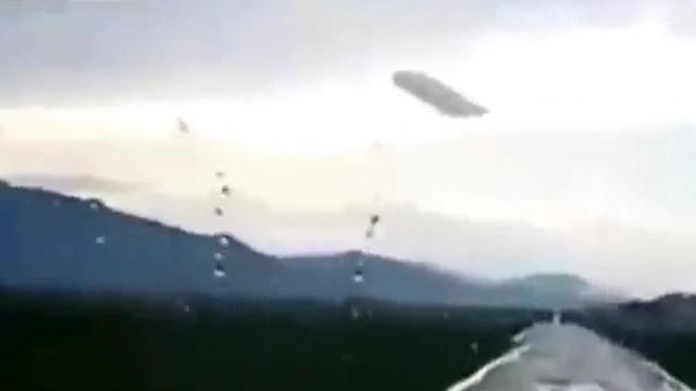 A Huge UFO was noticed by eyewitnesses on the way to the village of Ust-Koksa in Russia