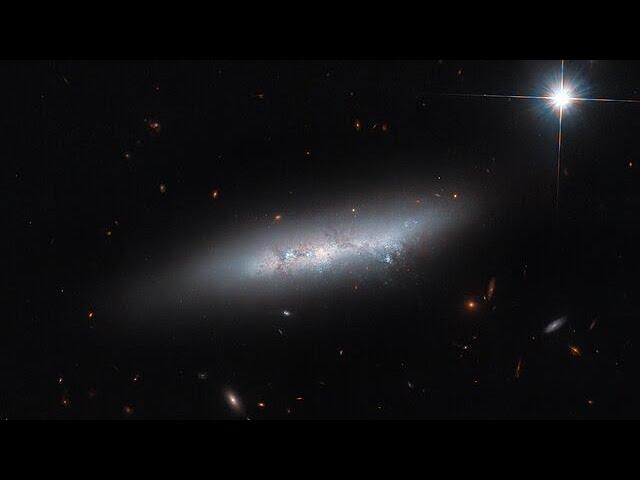 Pan: “Late-type” galaxy?