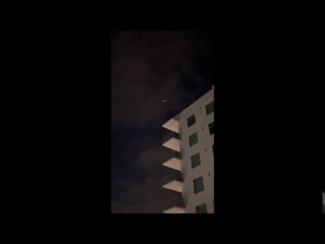 Rectangular UFO with three rows of lights underneath in Hollywood, Florida
