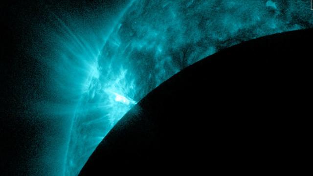 Volatile sunspot gets photobombed by the moon in amazing spacecraft view