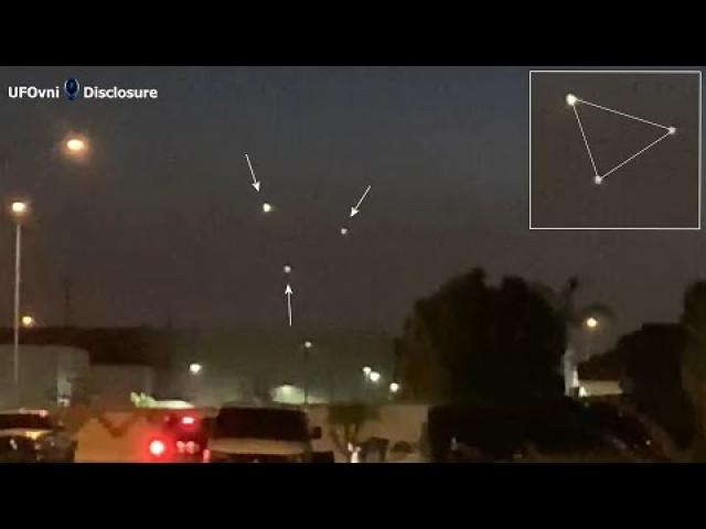 Three prominent hovering lights stationary and symmetrical eventually change to a triangle UFO