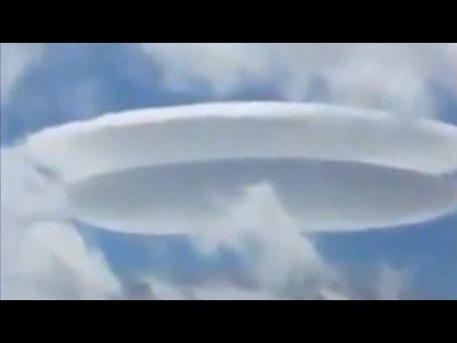 Two Huge Camouflaged Flying Saucers Caught on Video in Switzerland