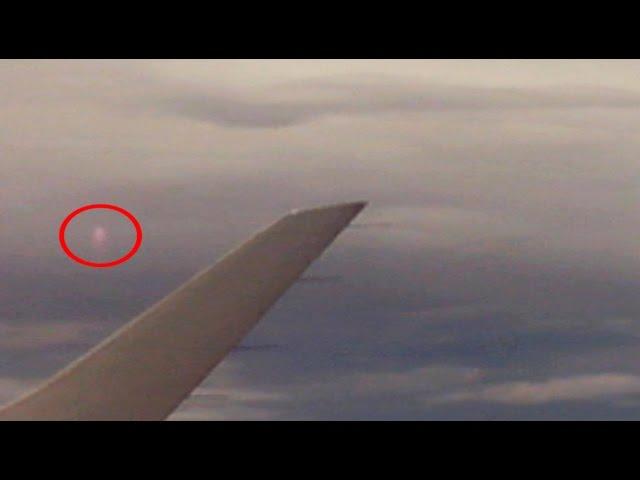 Astonishing! UFOs Recorded In Airplane Turbulence During Lightning Storm! 01/09/2015