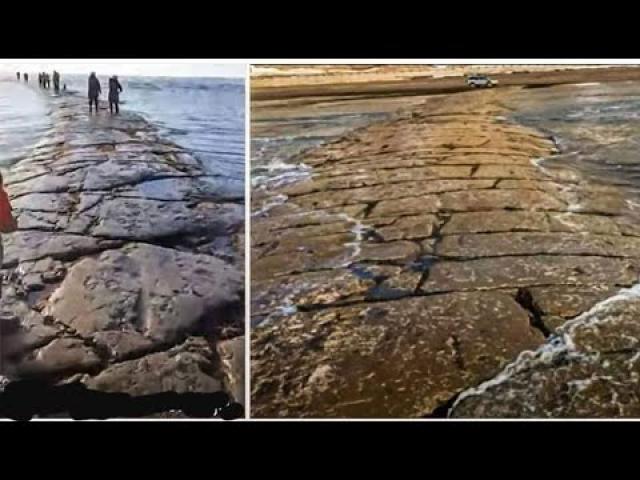 After an unusually strong tide, a huge stone road surfaced from beneath the Pacific Ocean