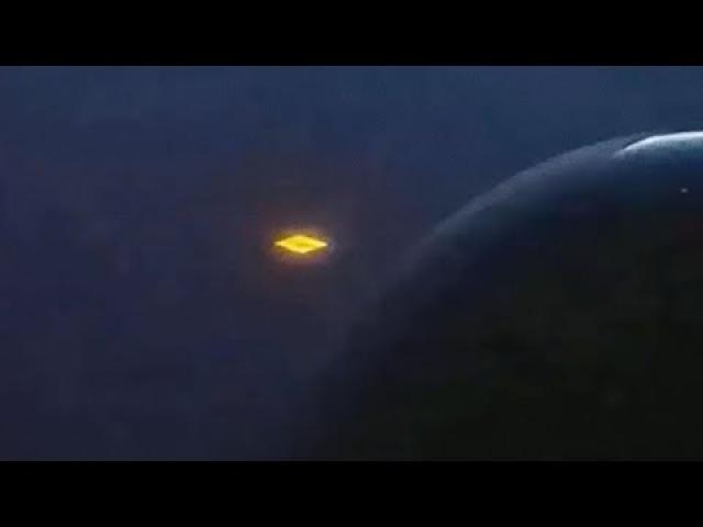 New Orange UFO Filmed in Russia from an airplane window, March 2020 ????