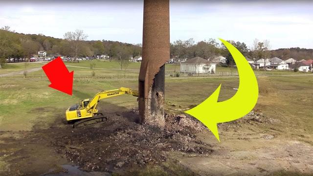 This Excavator Was Toppling An Old Smokestack When Suddenly The Unthinkable Happened