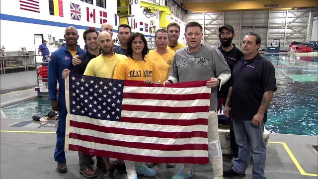 Astronauts cheer for Army-Navy game