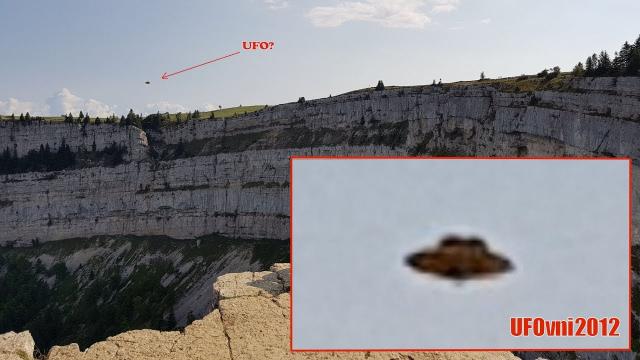 A beautiful Saucer (UFO) under the "Creux du Van" photographed by a Swiss witness