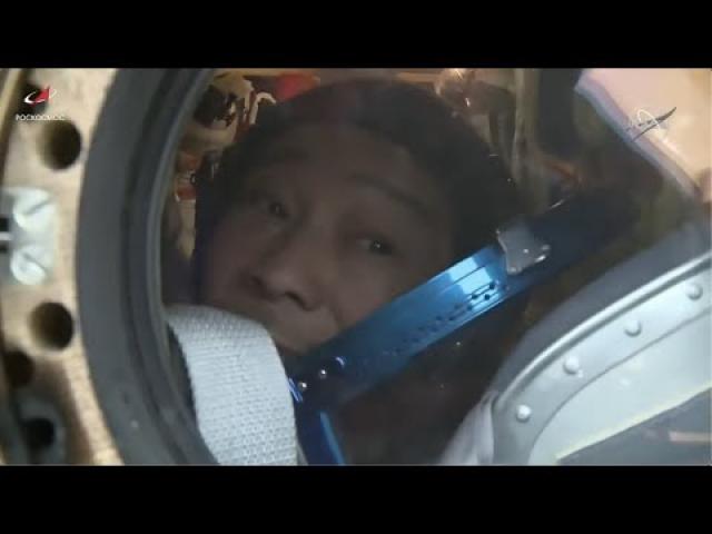 Japanese billionaire and crewmates extracted from Soyuz spacecraft after landing