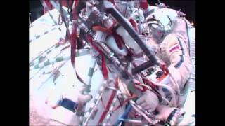 Cosmonauts Break Spacewalk Record Attempting To Install Cameras | Video