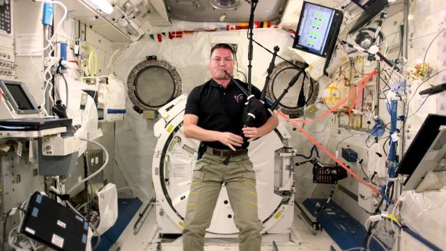 NASA astronaut Kjell Lindgren plays Amazing Grace on the bagpipes.
