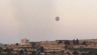 Huge UFO Sighting Massive Metallic UFO Or Drone Over Afghanistan 2012