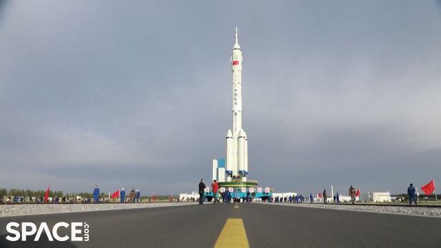 China's Long March 2F rocket rolled out for new space station crew launch