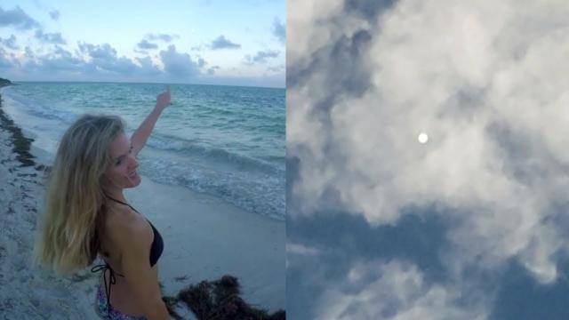 Strange Illuminated Spherical UFO Object Filmed Below Clouds over North North Carolina's Coastline