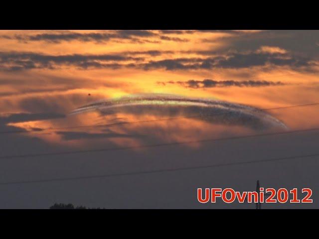 Amazing UFO Formation! Large Saucer Hidden In The Clouds (4K)