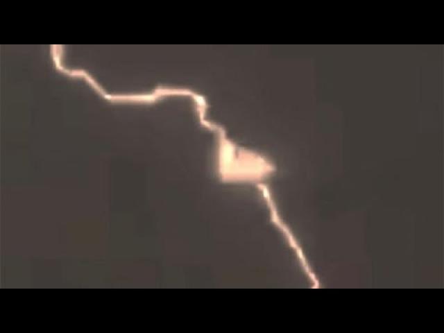 Stunning footage of UFO being hit by lightning
