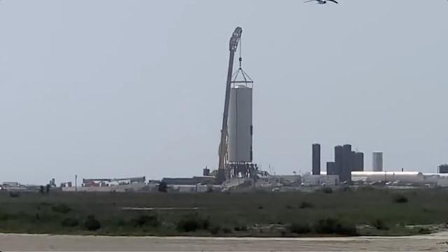 SpaceX Starship SN3 hoisted onto test stand in time-lapse video