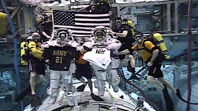 Astronauts give underwater shout-out for Army-Navy game