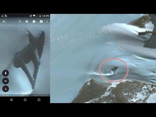 Huge Triangular UFO emerges from Antarctica ice