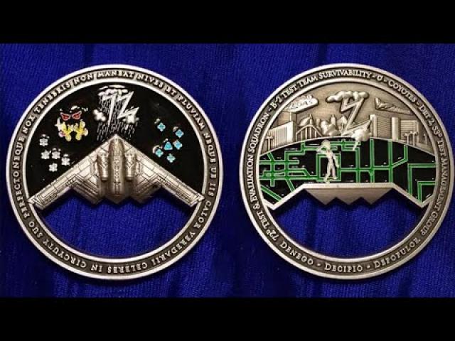 Secretive USAF Unit Depicts Aliens, Area 51, and Strange Symbols on Official Coins