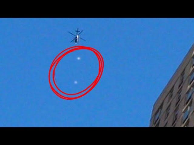 Two UFOs Hover In Front Of Helicopter In NYC October 2014