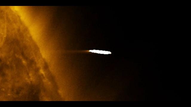 Giant Cigar Shaped Object Near the Corona of the Sun - May 2018