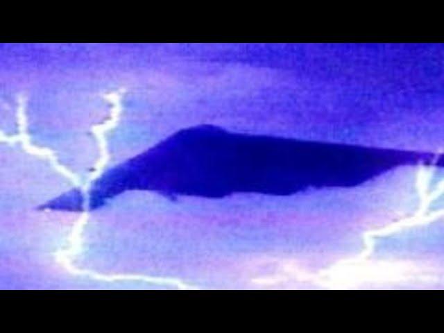 Huge UFO coming out of awesome lightning storm