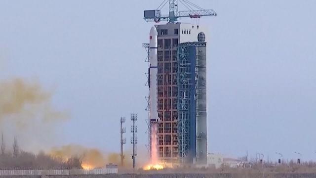 China's Long March 2D launches three satellites, rocket sheds tiles