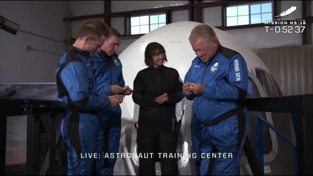 Blue Origin with William Shatner 'go for launch!' Crew gets coin to take to space