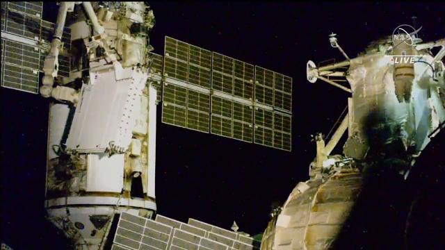 Robotic arm on space station moves radiator during Russian spacewalk