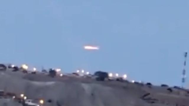 Huge Illuminated Cylindrical Cigar Shaped UFO Filmed By Truck Driver over Paita Port in Peru