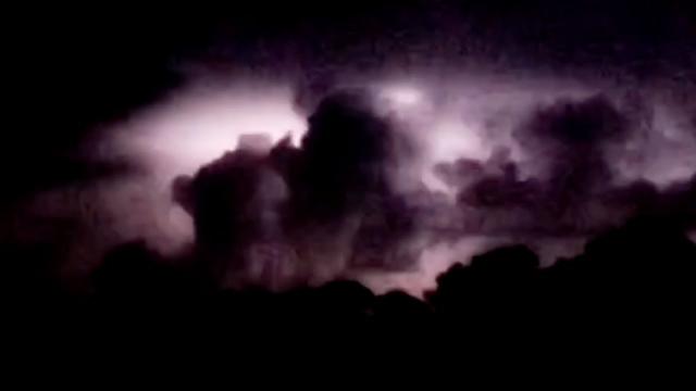 What Is That Object Behind The Clouds? Cube Shaped UFO Filmed During Thunderstorm over New Jersey
