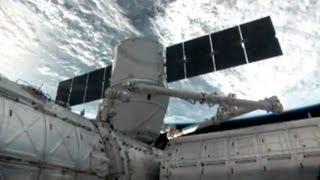 Dragon is Grappled and Attached to International Space Station