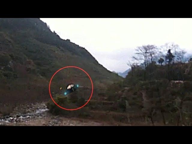 UFO caught on video flying along a river in China !!! July 2018