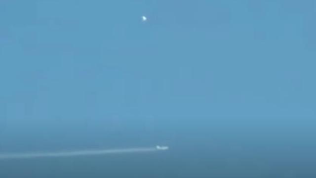 Two Glowing UFOs Following and Observing Passenger Airplane over Manchester, England (UK)