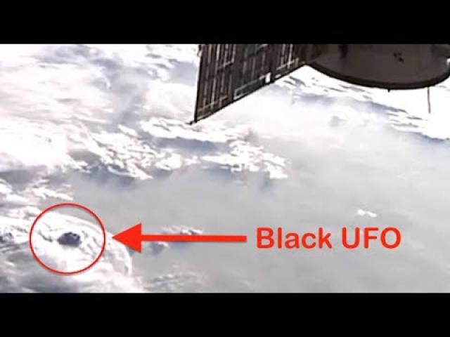 Black UFO Hides Over Clouds Caught By NASA Space Station Cam