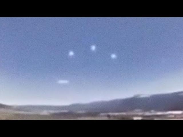 Disc Shaped UFO with Light Orbs Filmed over Santiago Mountains in CHILE ! ????