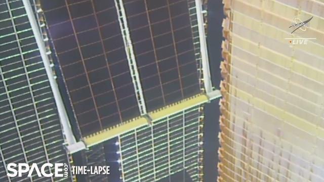 New roll-out solar arrays deployed on space station - 2nd time in a week!