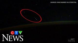 Cosmonaut sees UFOs while filming the Aurora Borealis