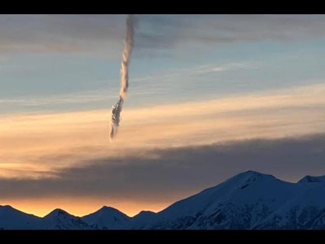 UFO over Alaska? or just a contrail from an Airplane that was headed straight down? YOU DECIDE!