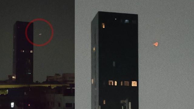 Strange luminous UFO spotted near Buildings, USA, April 2024 ????
