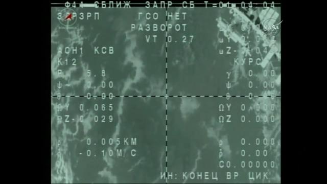 Peggy Whitson and Crew Pull Away from Space Station in Soyuz Spacecraft