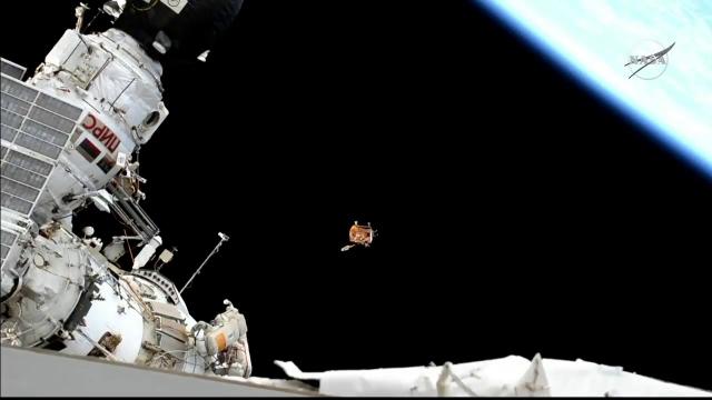 Spacewalker Tosses Experiment Away From Space Station