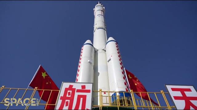 Chinese Shenzhou-14 crew's Long March-2F rocket rolled out to launch pad