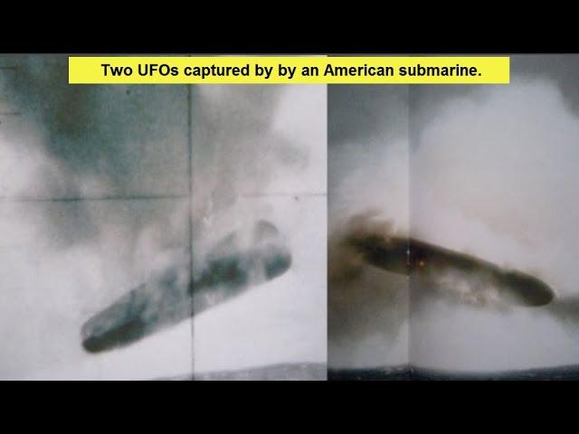 Huge Cigar shaped UFO emerges from the ocean