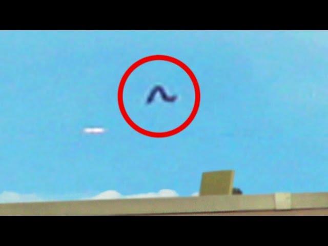 Odd Looking Worm Shaped UFO Sighting Flying In NY Sky September 2014